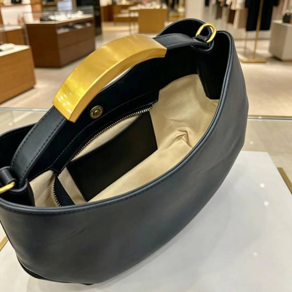 Halvemaanvormige dames handtas - Luxury Bags Expensive recensie en prijs